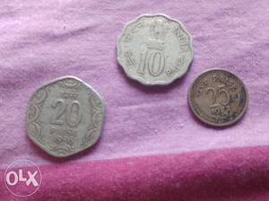 Three Silver-colored , And 20 Indian Coins