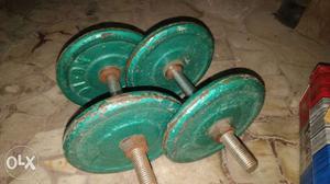 Two Green Dumbbells. Each is of 10kg