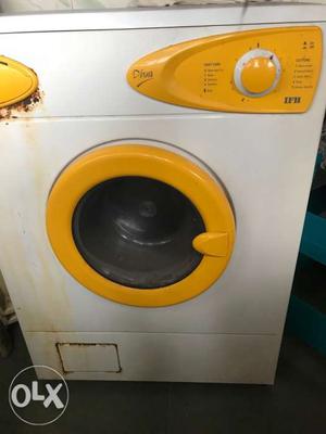 White And Yellow Front-load Washing Machine