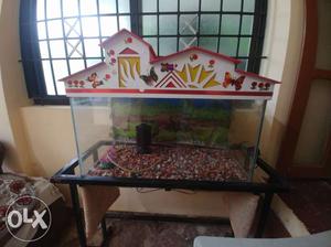 Fish tank with iron stand.