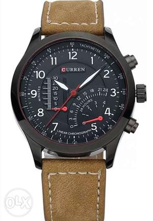It Is A New Watch With Brown Leather With 10