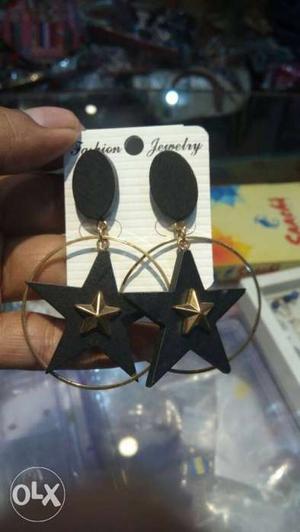 Pair Of Black Star Pendant Earrings