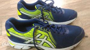 Pair Of Blue-and-green Asics Running Shoes