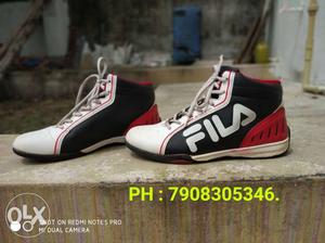 Size 6.Fila original sports shoes with original bill.