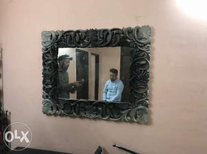 Antique wooden frame with mirror