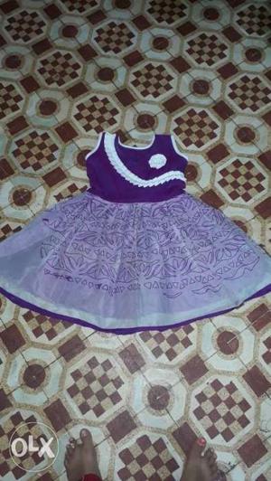 Blue And Purple Floral Textile