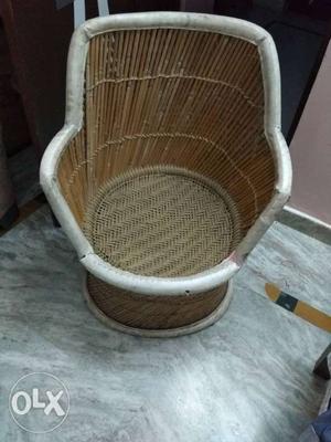 Brown And White Rattan Chair