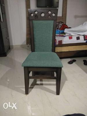 Brown Wooden Framed Green Padded Chair