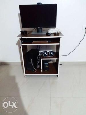 Brown table with white border.. bought 2 months back.. has