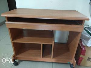 Computer table with sliding keyboard shelf and