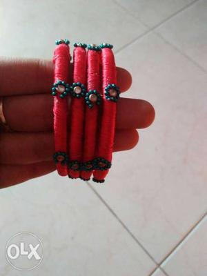 Four Red Bangle Bracelets