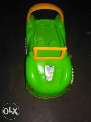 Green And Black Plastic Toy Car