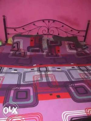 King size bed with mattres in good condition...