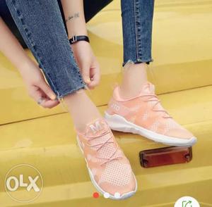 Pair Of Orange Low-top Sneakers