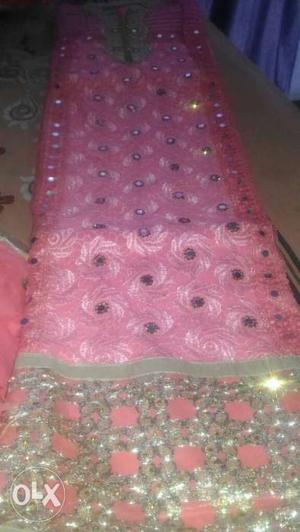 Pink And Gold Textile
