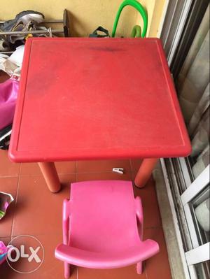 Red And Gray Plastic Table