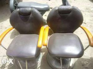 Two Black Leather Padded Salon Chairs