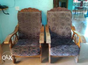 Two Brown Wooden Framed Gray Fabric Padded Armchairs