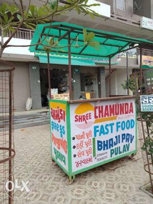 White And Multicolored Food Stand