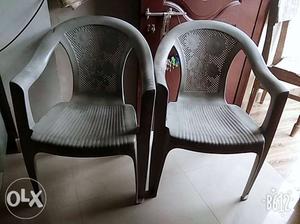 A pair of durable chairs is available for sale