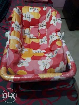 Baby's Red And White Bouncer