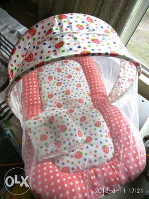 Baby's White And Red Polka-dotted Bed Nest