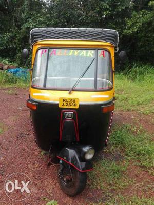 Black And Brown Bajaj RE Auto Rickshaw