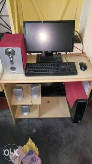 Brown Wooden Computer Desk And Desktop Computer