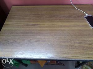 Iron legged wooden table