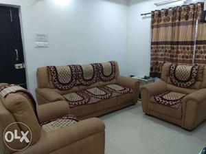 One year old 5 seater sofa set with sofa covers