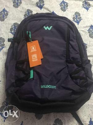 Purple Wildcraft bag new with warranty
