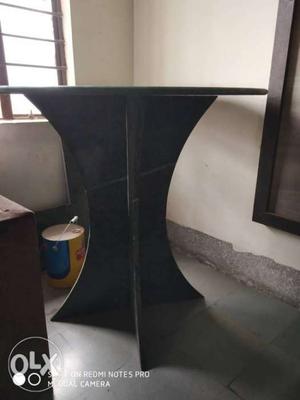 Round green marble table 4.5 ft height with curvy design