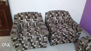 Two Brown-and-black Fabric Sofa Chairs