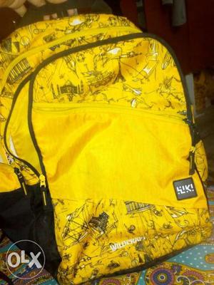 Wiki Wildcraft 29 litres Doodle 1 Yellow School Bag.