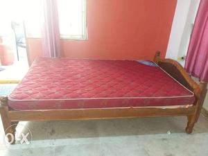 Wooden double cot with mattress