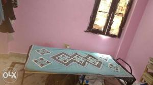 1 wooden foldable bed in very good condition...