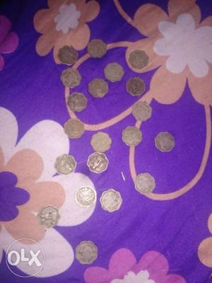 20 ten ruppes coins slightly adjustable