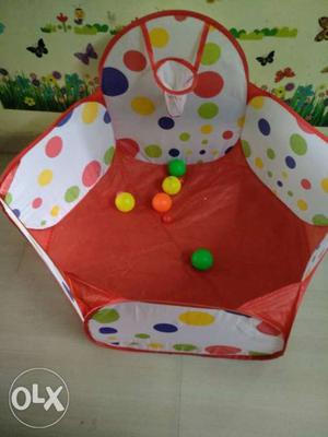 Baby's Red And White ball pit