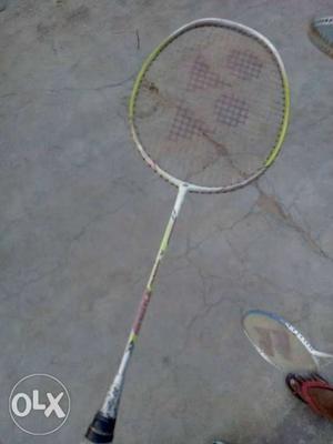 Black Handled White And Yellow Yonex Badminton Racket