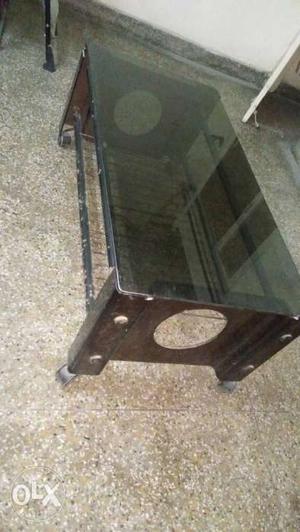 Center table black in colour. good in condition