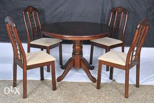 Dark Coloured Round Malaysian Made Wooden Dinning Table Here
