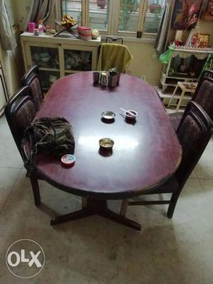 Dinner table with six chair made of teak wood in