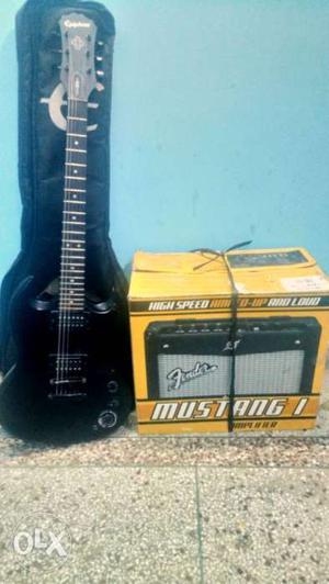Epiphone SG matte black guitar with Fender Amplifier