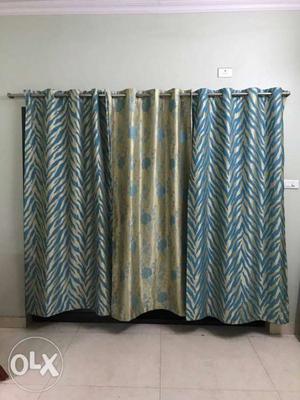 Printed curtains in dual designs. can take any.