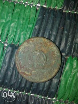 Round Green And Brown Coin