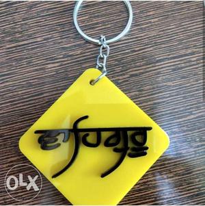 Yellow And Black Foreign Script Keychain