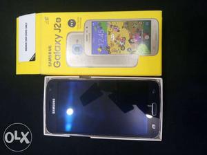 Good condition Samsung Galaxy j black with full box