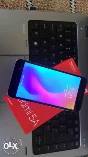 Redmi 5A 2G16G. 6 months old device. Charger and