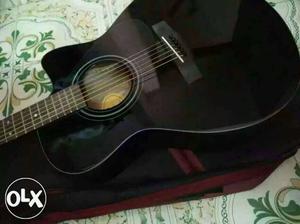 YAMAHA Black Single Cutaway Acoustic Guitar And Red Guitar