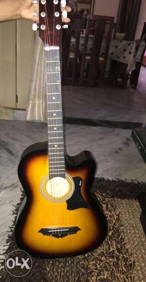 Almost new guitar, cover included, extra strings